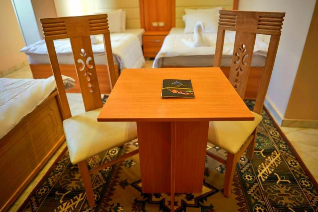 Grand Golden Pyramids View Hotel Kafret el-Gabal Esterno foto